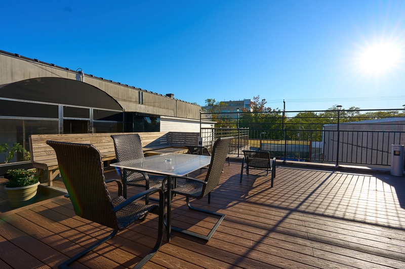 Rooftop deck with tables and chairs